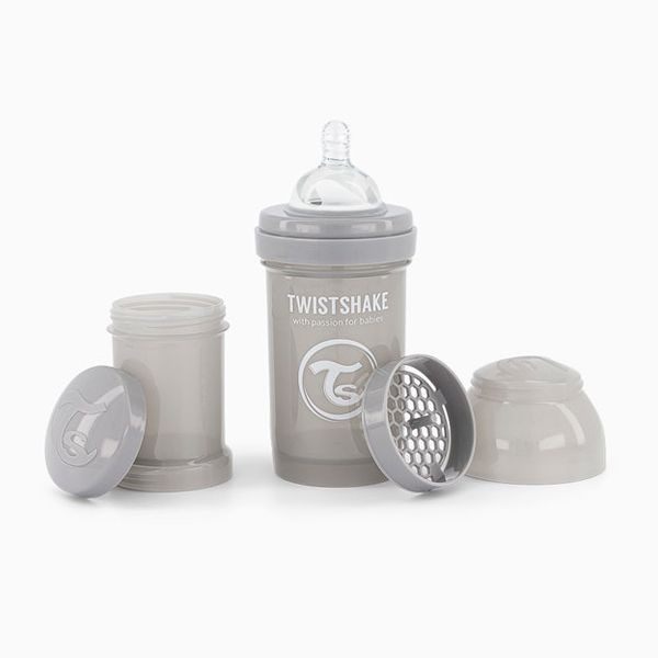 شیشه شیر آنتی کولیک تویست شیک 180 میلی لیتر twistshake اورجینال همراه با ظرف شیرخشک
