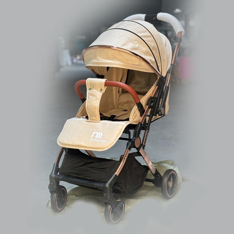 کالسکه مسافرتی دسته دو طرفه رو به مادر شو mothercare مادرکر