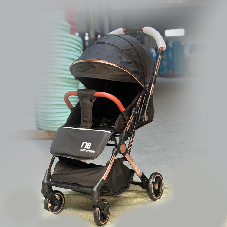 کالسکه مسافرتی دسته دو طرفه رو به مادر شو mothercare مادرکر
